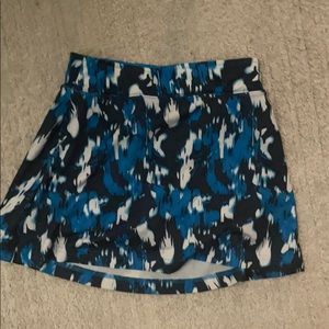 Blue abstract skort with built in ball pockets